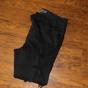 Torrid jeans-waist band is stretchy. Worn only a couple of time
